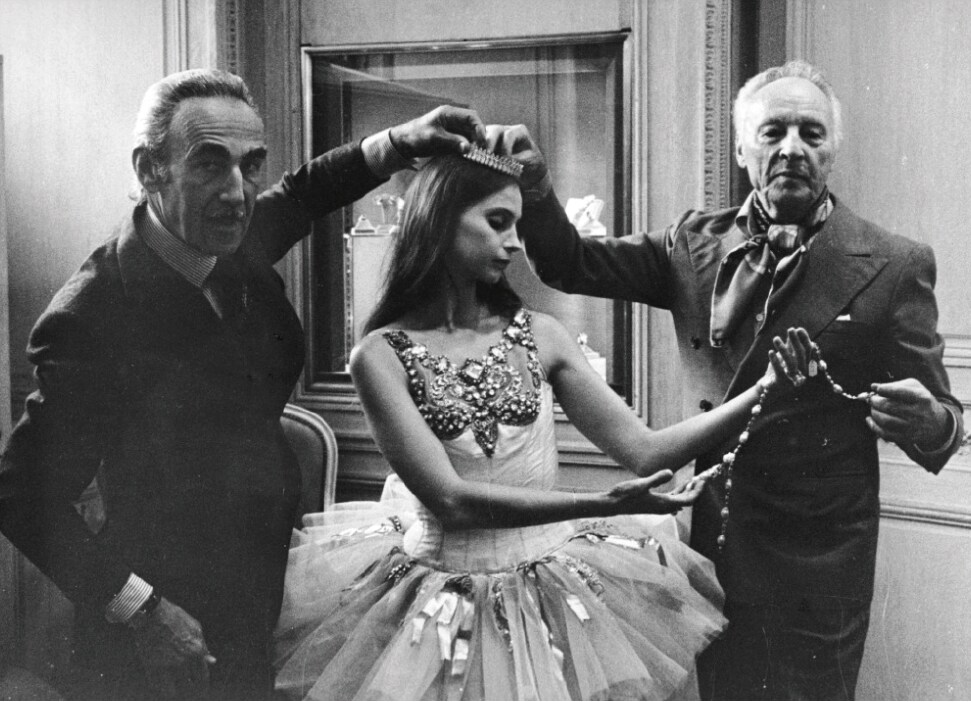 Pierre Arpels and George Balanchine surrounding the dancer Suzanne Farrell