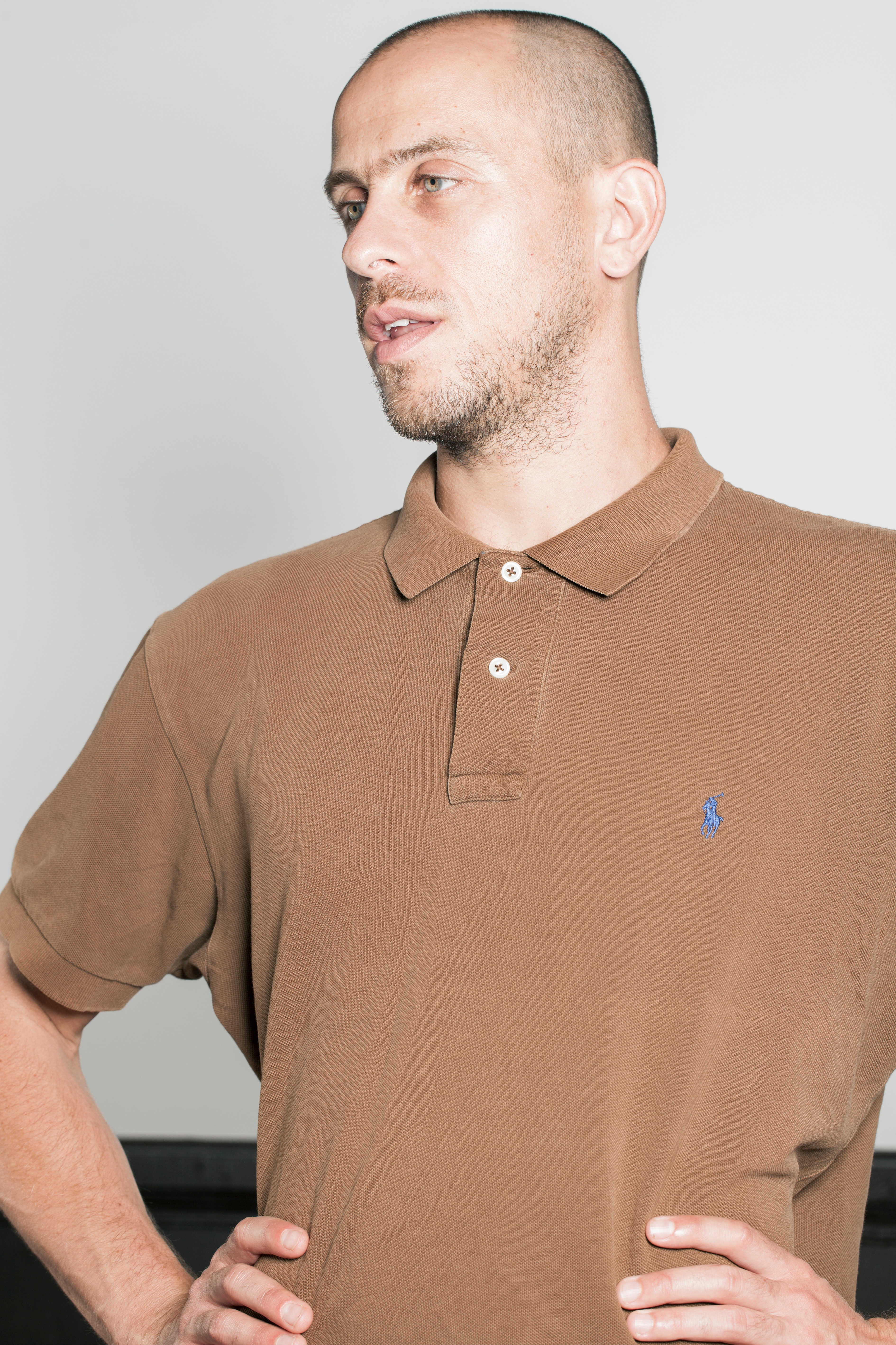 man with a brown t-shirt