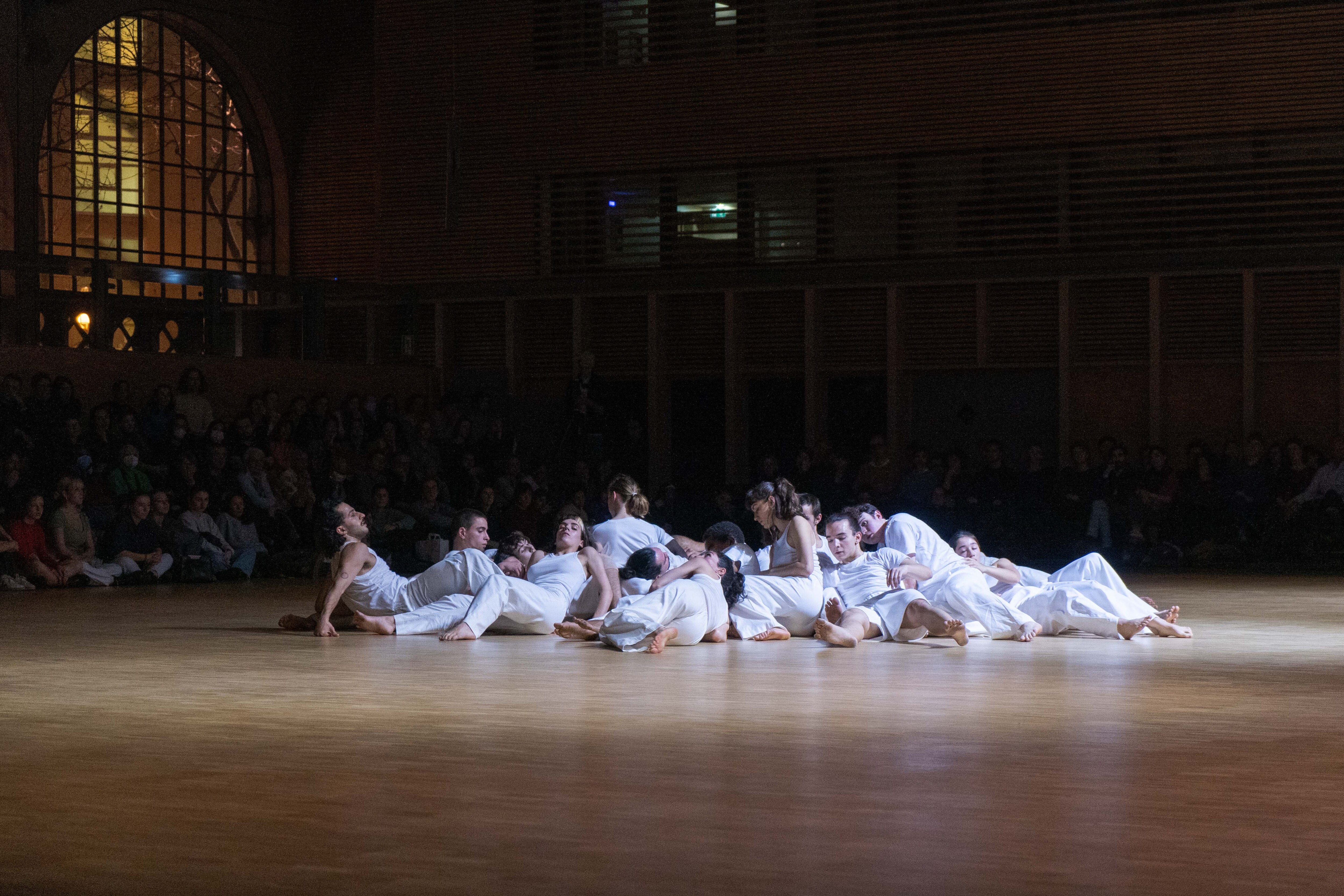 Dancers grouped on the floor
