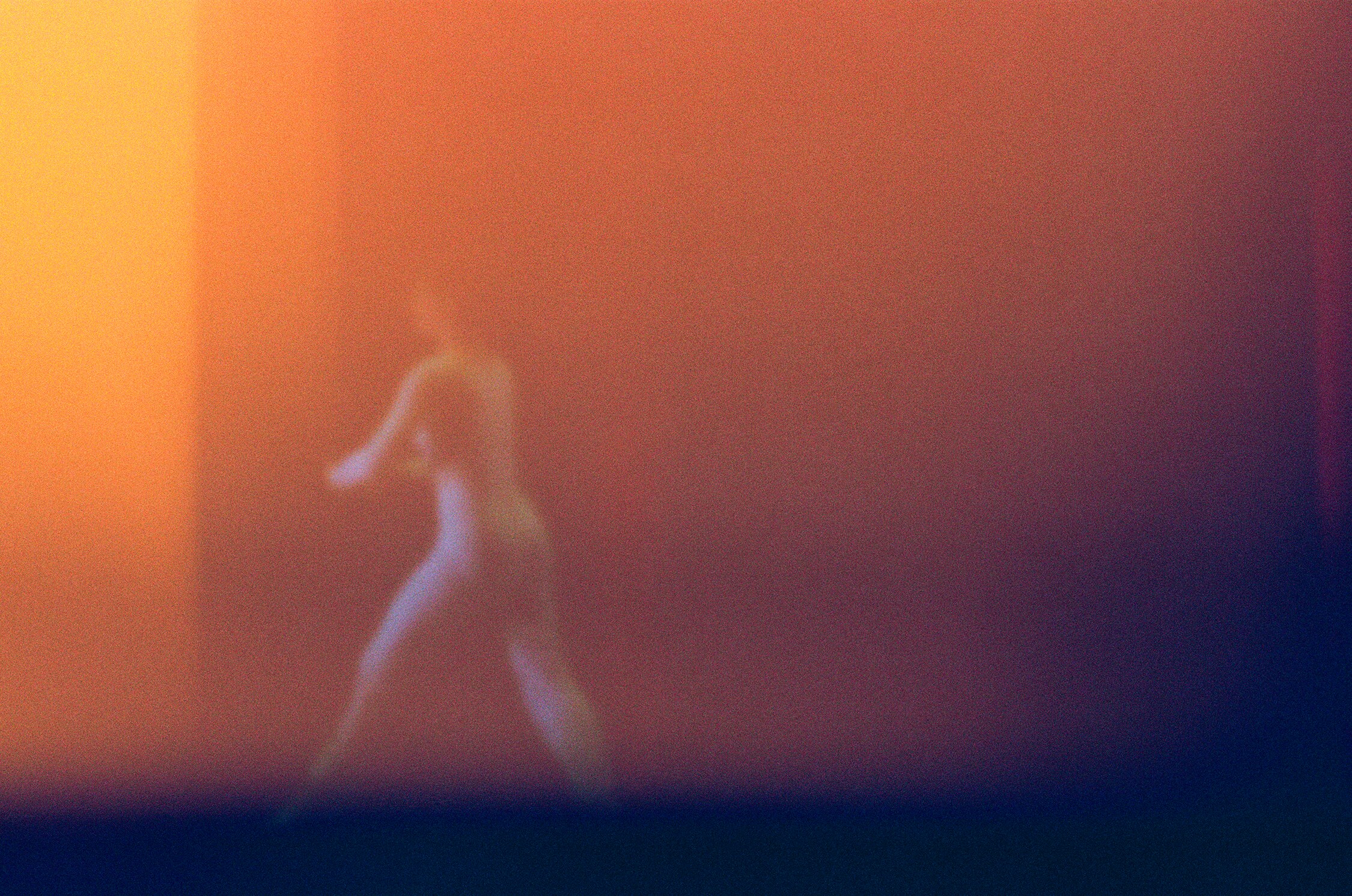 Dancer in movement from behind