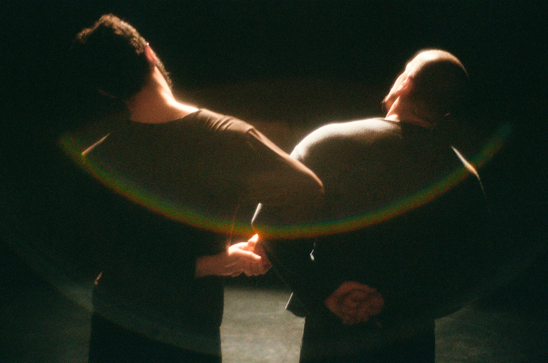 Dancers crossing arms with each other