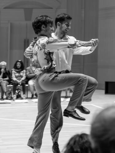 Dancer duo performing for an audience.