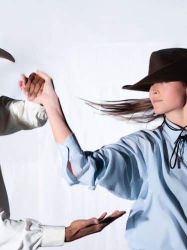 Dancers dressed as cowboys