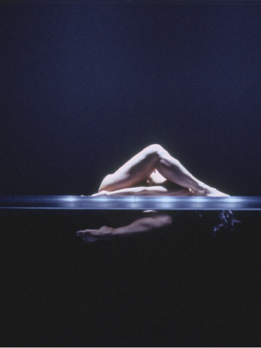 Naked dancer lying 