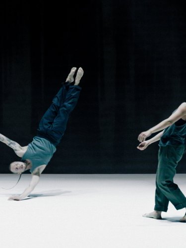 Dancers doing accrobatics movements