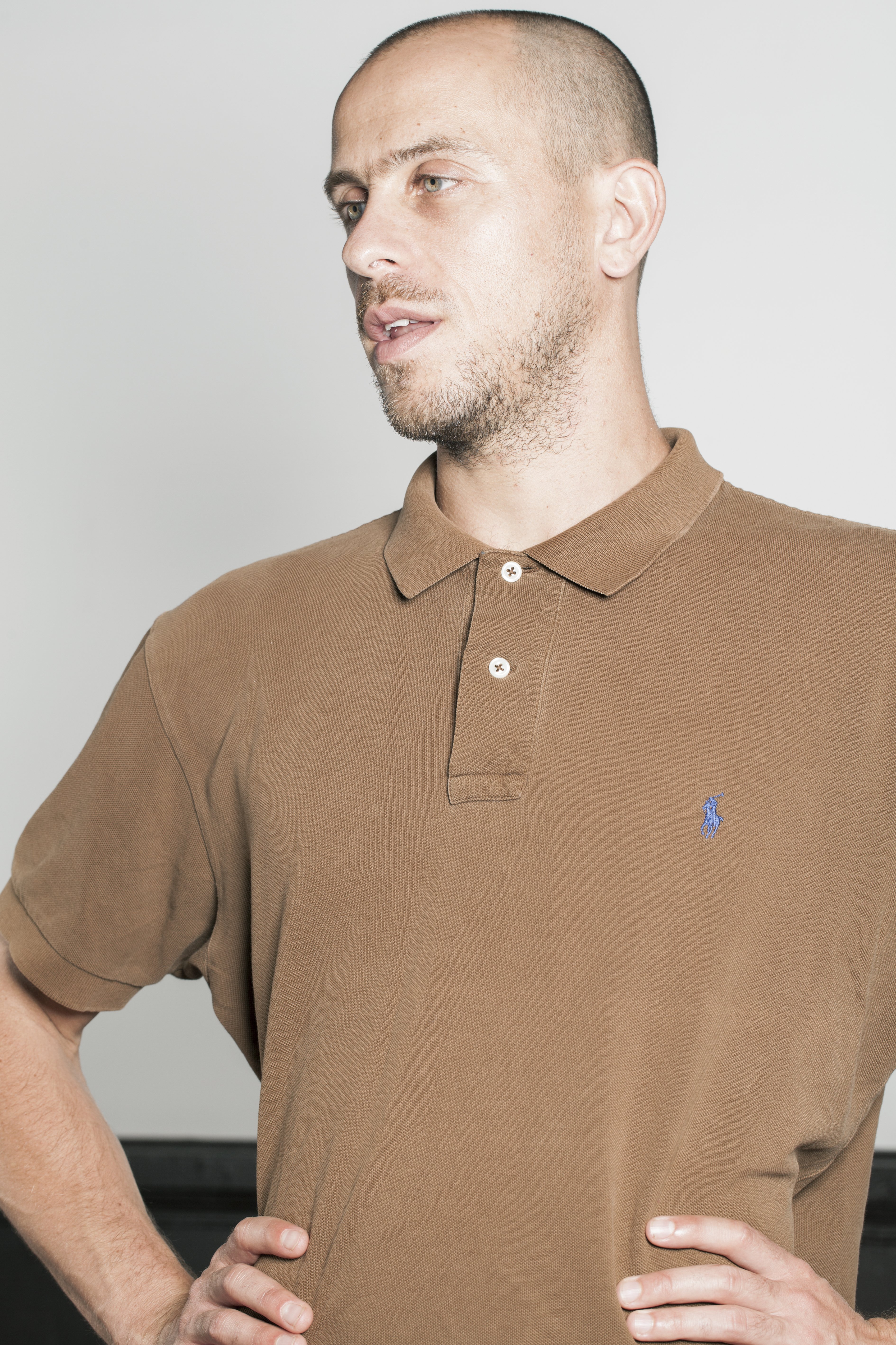 man with a brown t-shirt