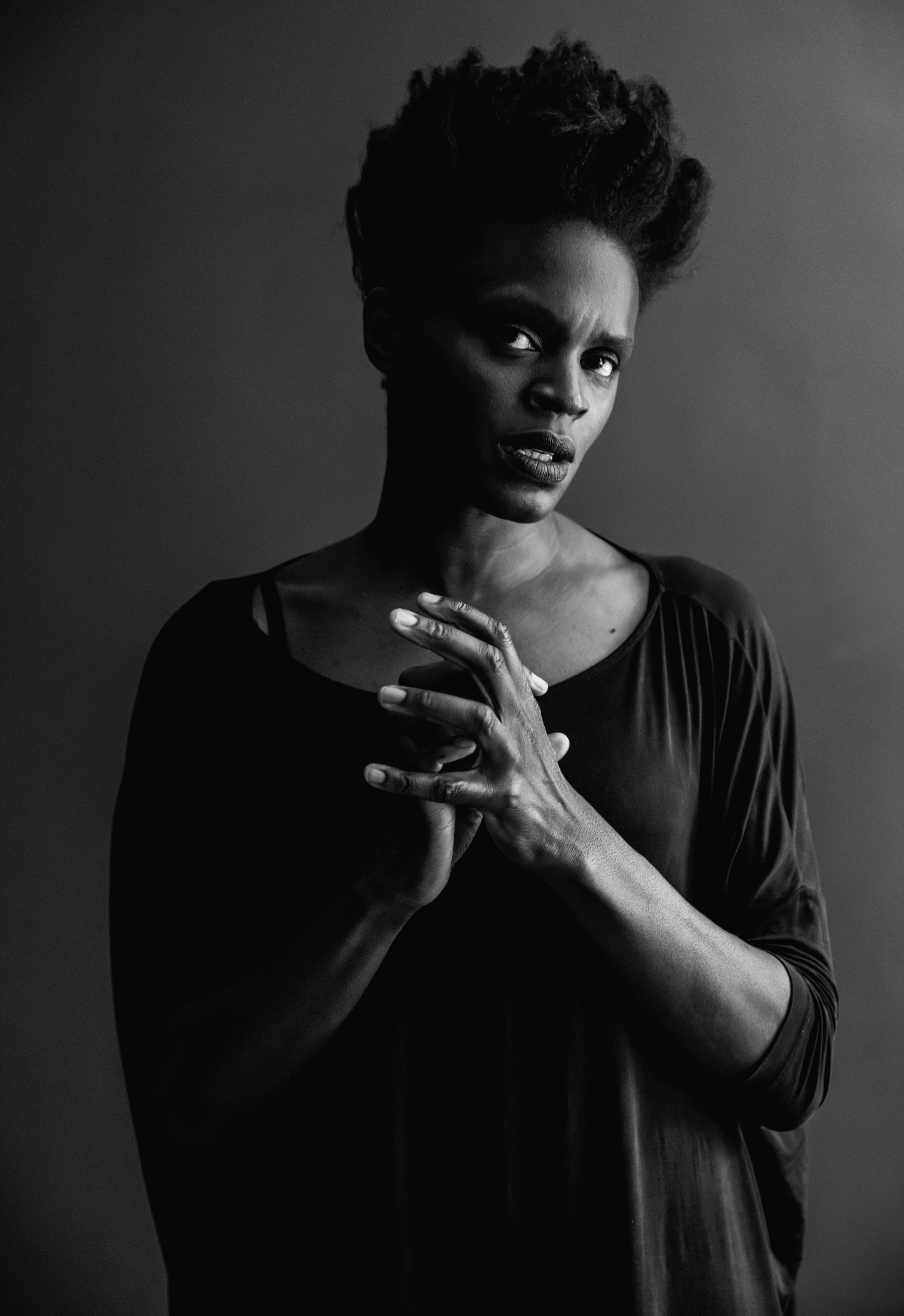 Black and white headshot of Okwui Okpokwasili