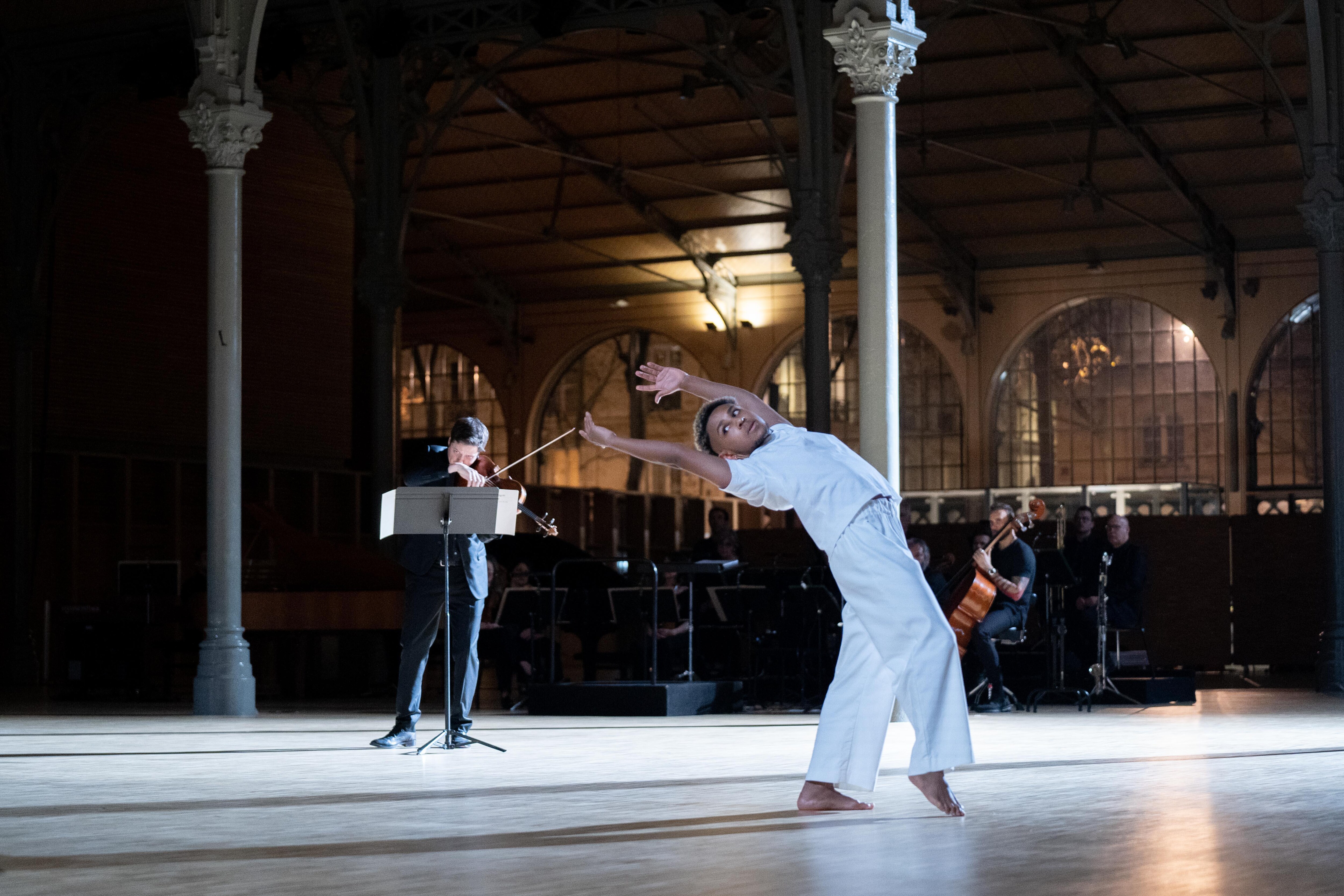 Dancer bent backwards, arms in crown