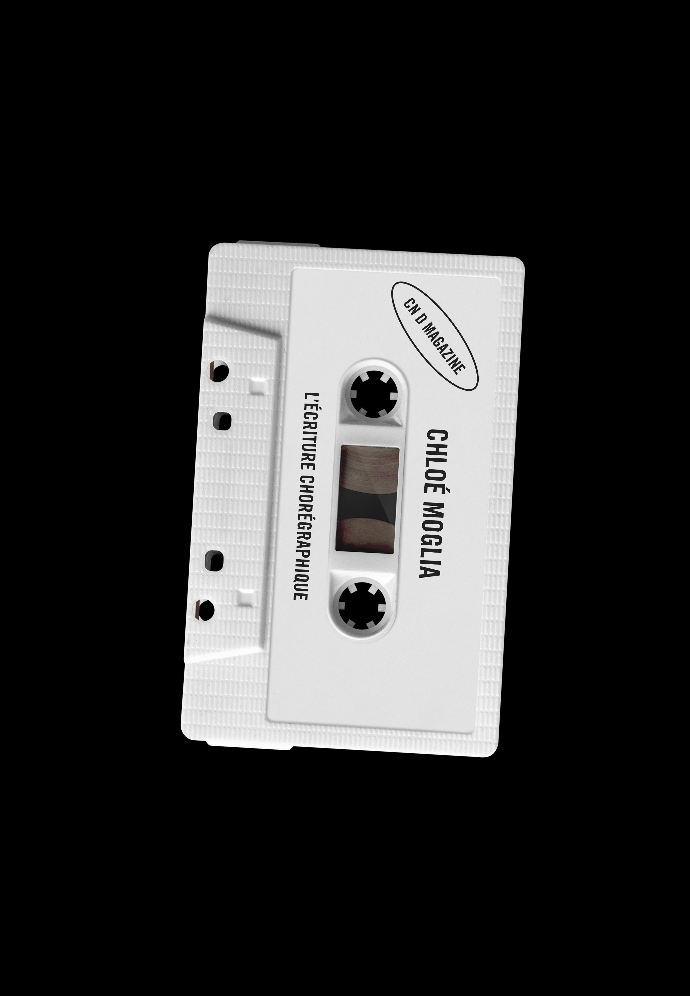 a white audio cassette bearing the name of Chloé Moglia