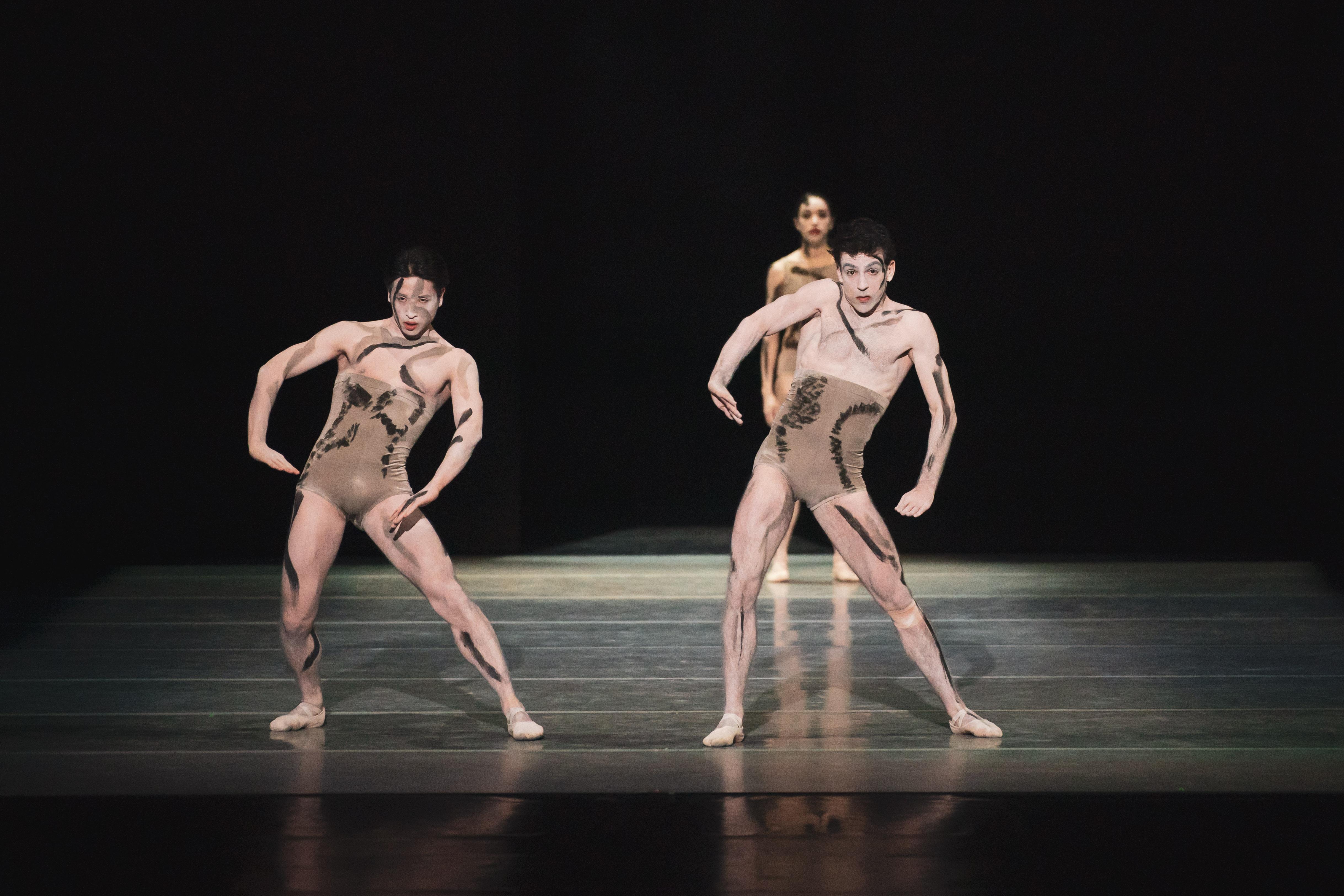 three dancers on stage