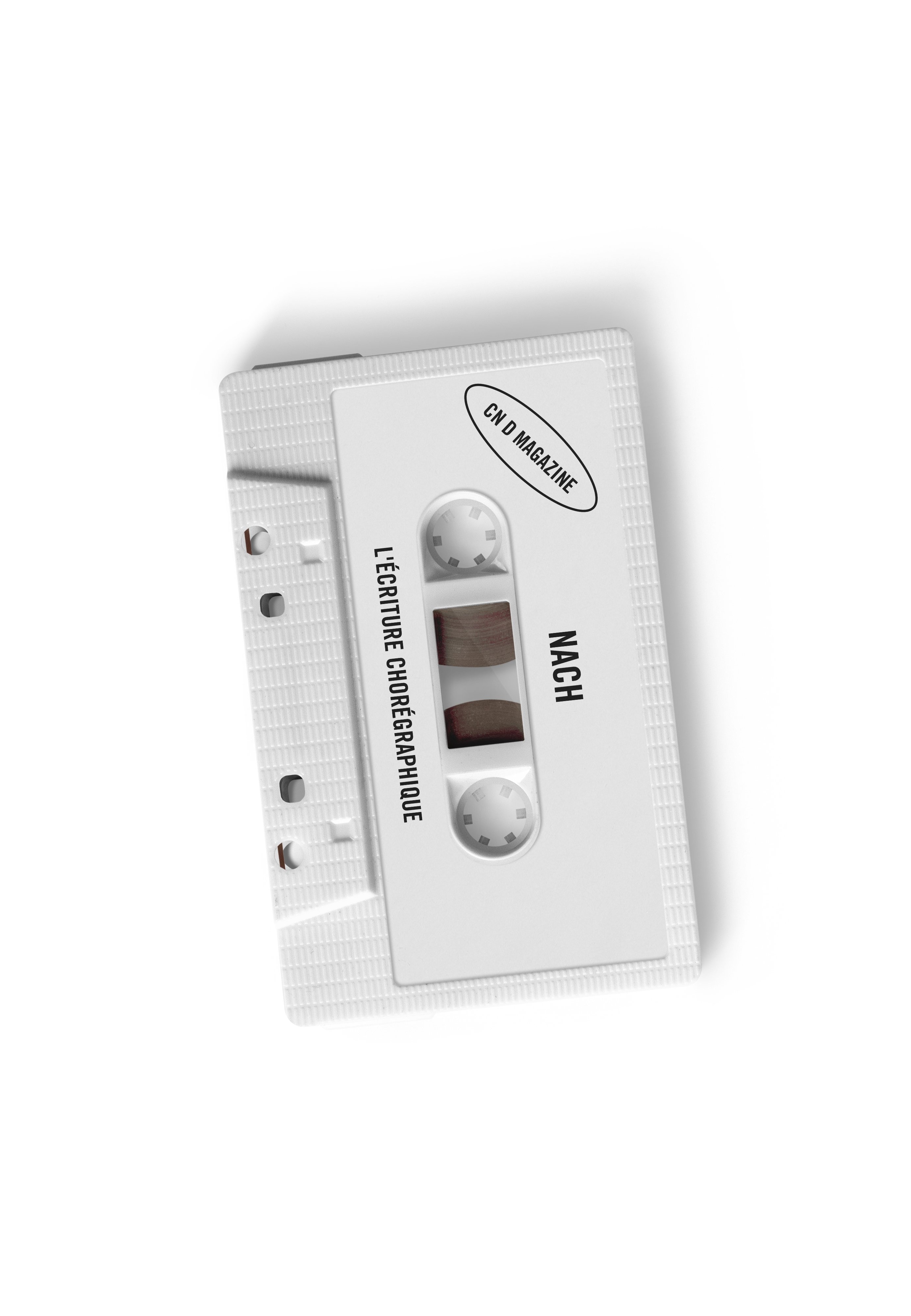 A white audio cassette on a black background with the name of Nach