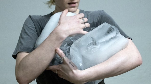 Person carrying ice blocks, from The Second Body