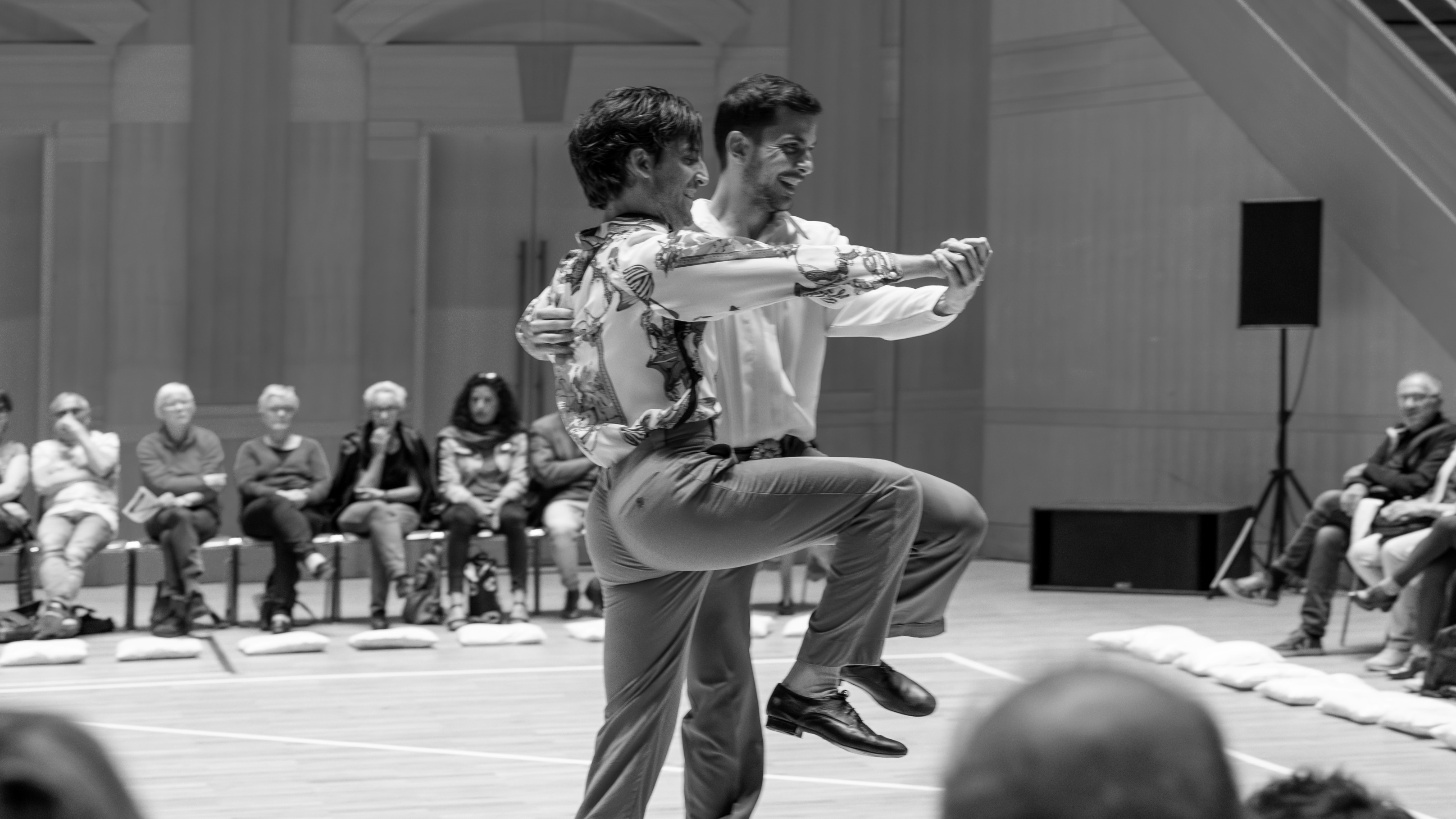 Dancer duo performing for an audience.