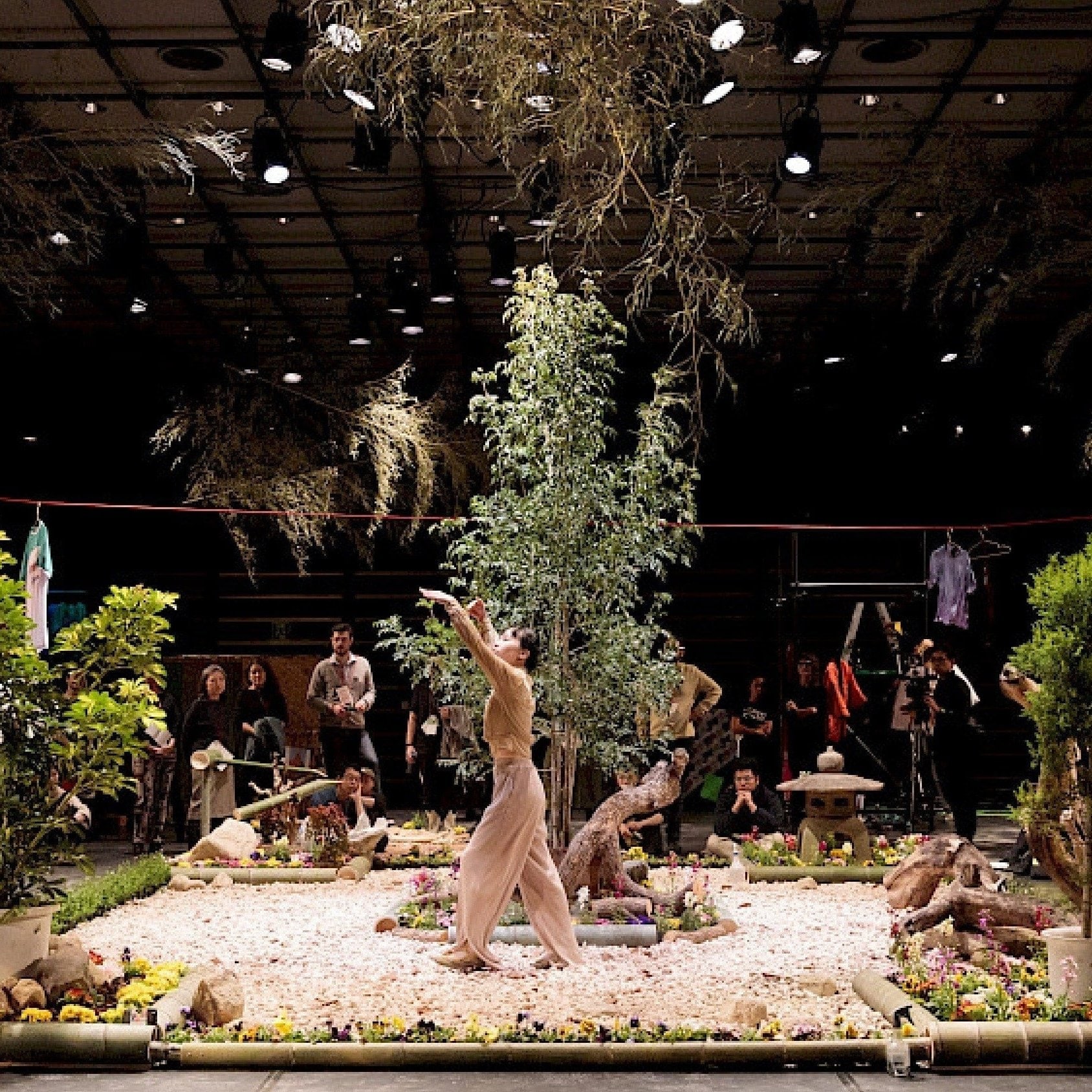 Ayaka Nakama in a garden on stage