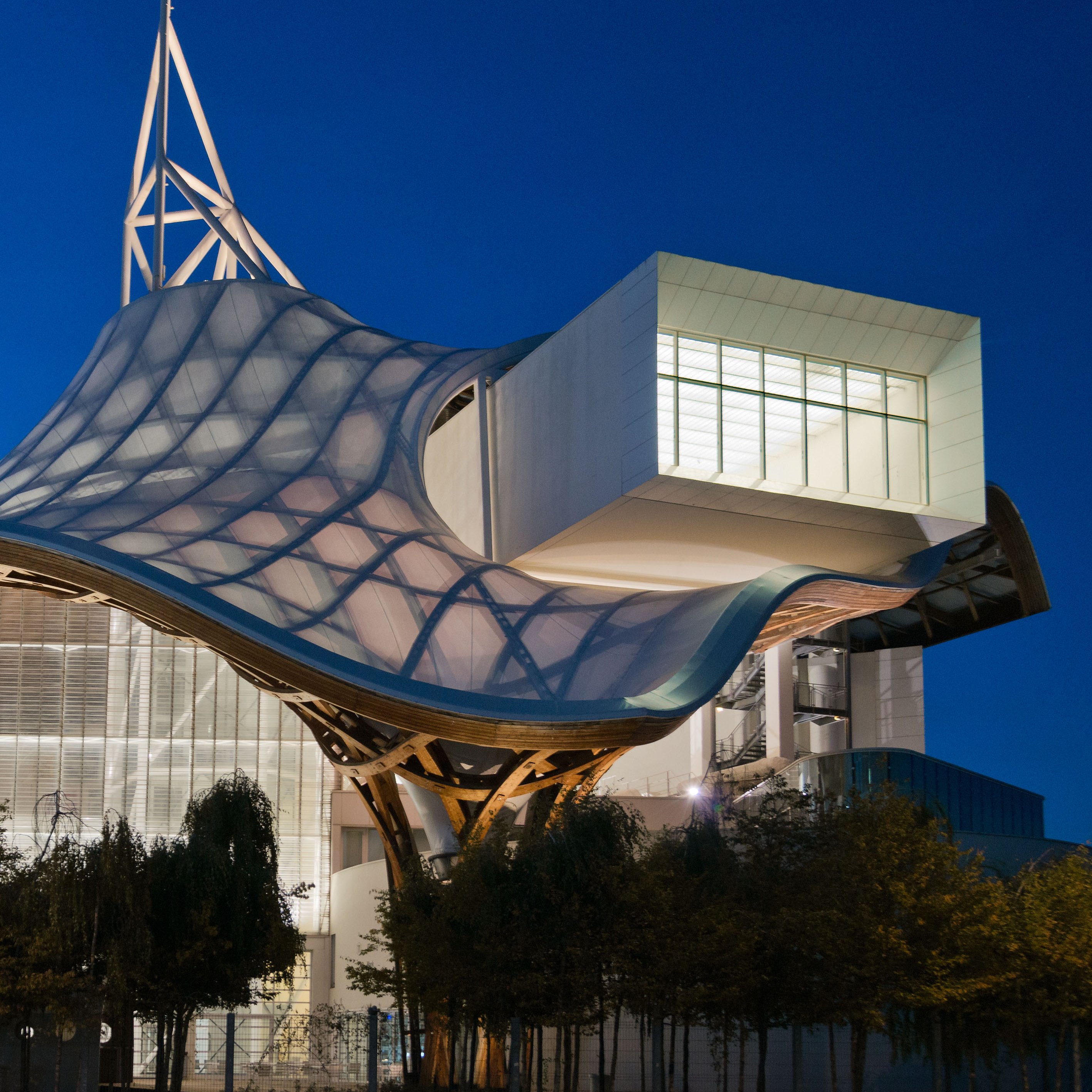 View of the outside of the Centre Pompidou-Metz building at night