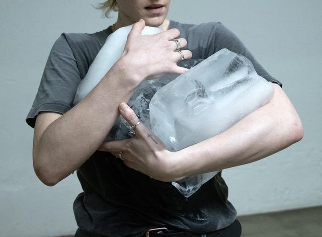 Person carrying ice blocks, from The Second Body